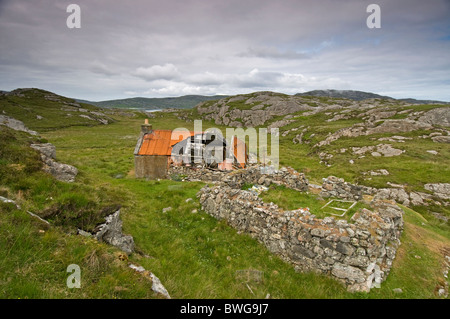 Il abbandonato rovinato crofting frazione a Roisinis su Eriskay, Ebridi Esterne, Western Isles. La Scozia. SCO 6904 Foto Stock