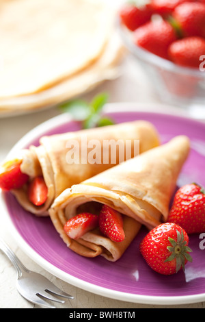 Crepes e fragole Foto Stock