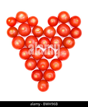 Pomodori formata in forma di cuore - una dieta sana Foto Stock