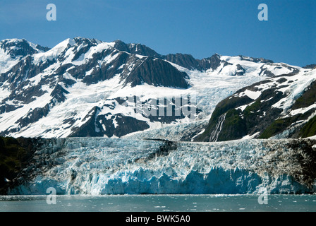 Sorpresa panorama sul ghiacciaio del ghiacciaio del paesaggio montagne neve ghiaccio mare Harriman fjord Prince William Sound Foto Stock