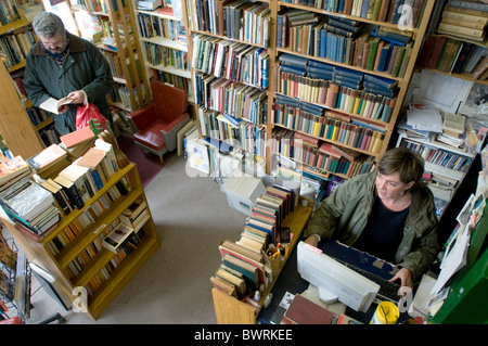 Usate la bookshop proprietario e il cliente Foto Stock