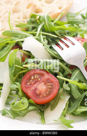 Insalata di rucola con pomodoro e pecorino Foto Stock