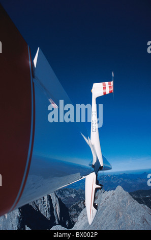 Aeroplano flies montagne Aliante Glider vela vola volo deltaplano volare Sport Foto Stock