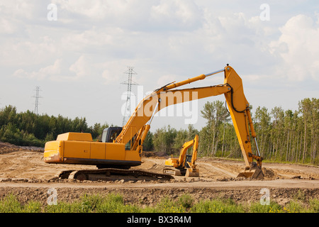 Strada in costruzione utilizzando un cucchiaio rovescio; Edmonton, Alberta, Canada Foto Stock