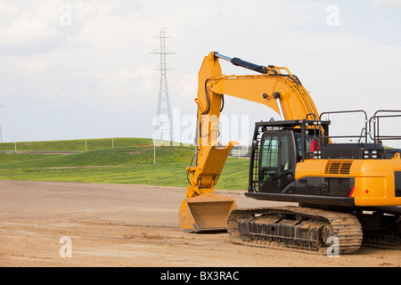 Strada in costruzione utilizzando un cucchiaio rovescio; Edmonton, Alberta, Canada Foto Stock