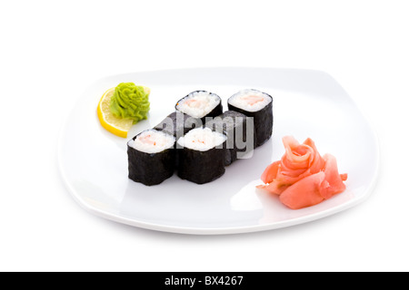 Immagine di ebi sushi hosomaki con zenzero sott'aceto e wasabi su una piastra Foto Stock