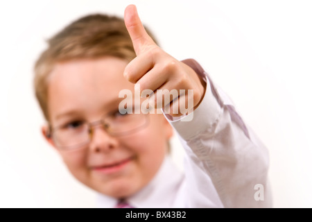 Immagine della mano infantile che mostra il pollice in alto Foto Stock