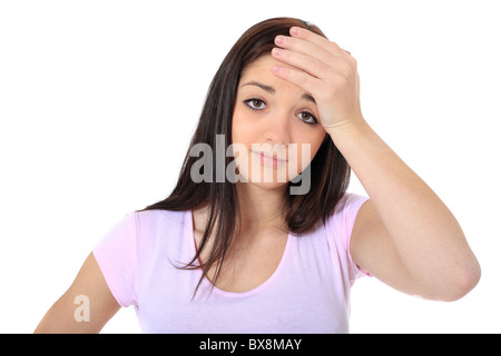 Attraente ragazza adolescente che soffre di mal di testa. Tutto su sfondo bianco. Foto Stock