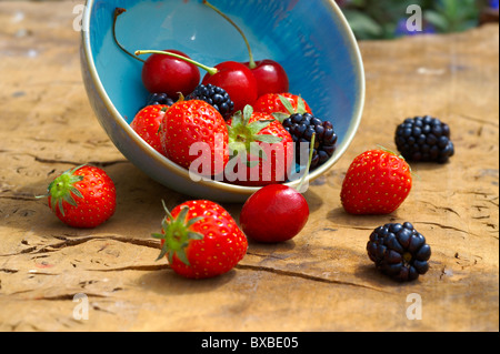 Mixed summer fruits - strawberries, cherries , blackberries Foto Stock