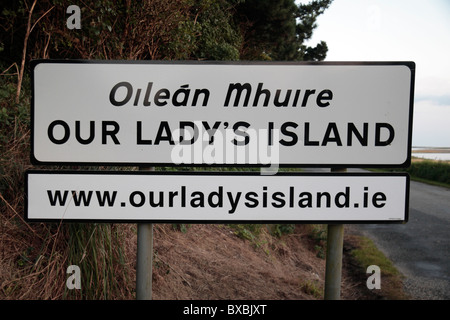 Cartello stradale per la Madonna di isola, County Wexford, Irlanda (Eire). Foto Stock