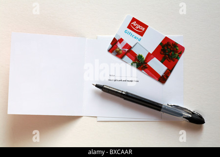 Ottenere pronto per scrivere in Argos Natale Giftcard gift card isolato su sfondo bianco Foto Stock