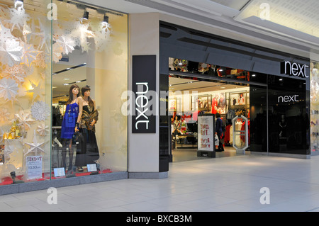 Prossimo negozio nel centro commerciale per lo shopping Foto Stock