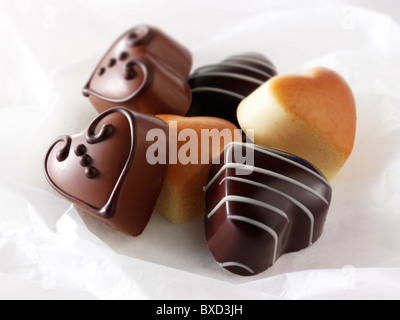 A forma di cuore ad cioccolatini Foto Stock
