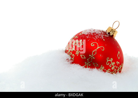 Red palla di Natale in fiocchi di neve Foto Stock