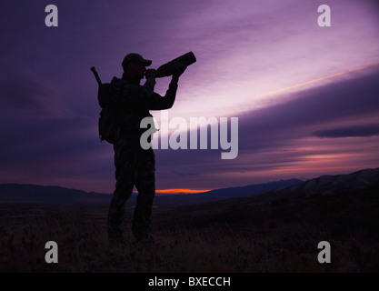 Big Game Hunter al crepuscolo Foto Stock