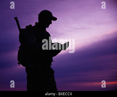 Big Game Hunter al crepuscolo Foto Stock