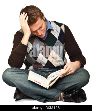 Sit giovane studente con Libro isolato su bianco Foto Stock