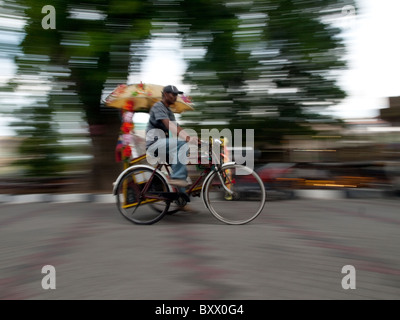 In Trishaw sfocatura del movimento Foto Stock