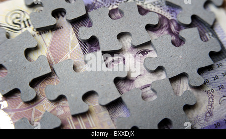 BRITSH venti Pound £ 20 nota mostra QUEENS HEAD con pezzi di puzzle RE I COSTI DI DENARO SUI MERCATI SOGGETTI FINANZIARI ETC REGNO UNITO Foto Stock