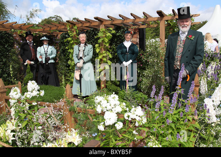 RHS Tatton, Cheshire. Tatton Park soci e i volontari vestito in costume vittoriano della RHS Tatton show. Foto Stock