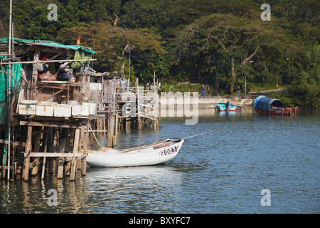 Stilt case nel villaggio di pescatori, ma Wan, Hong Kong, Cina Foto Stock