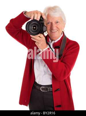 Un senior donna è fotografare voi. Foto Stock