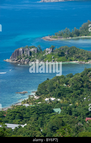 Seychelles, Isola di Mahe. Costa occidentale di Mahe, Porto Ternay il Parco Marino Nazionale. Foto Stock