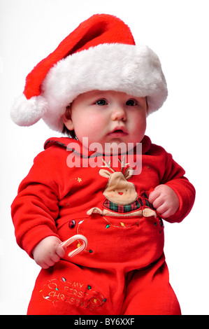 Bambino vestito in santa tuta di natale Foto Stock