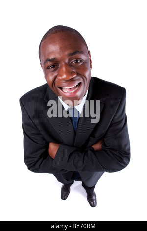 Imprenditore africano sorridente a voi (vista sopra e isolato su bianco) Foto Stock