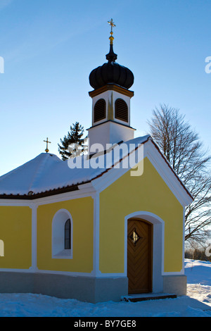 Alta Baviera, cappella in inverno Foto Stock