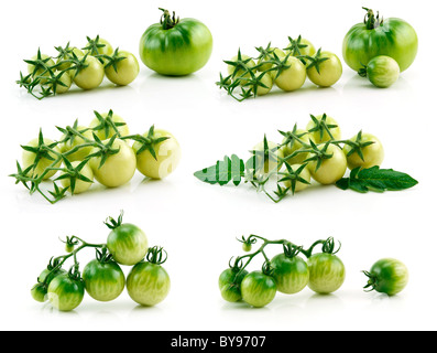 Set di Giallo maturo e pomodori verdi isolati su bianco Foto Stock