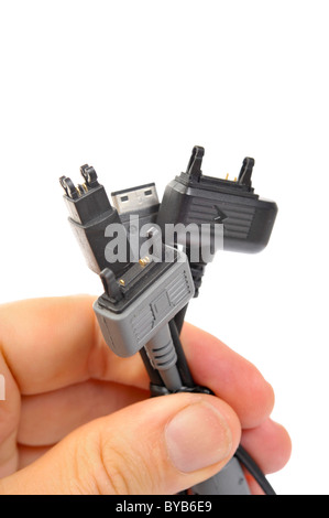 Vari tappi per telefono cellulare connessioni di carica, micro-USB plug normalizzazione nel 2011 Foto Stock