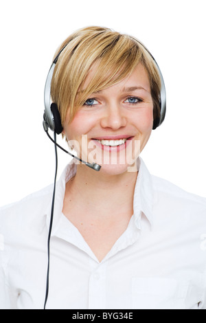 Receptionist con cuffie contro uno sfondo bianco, sorridente, ritratto Foto Stock