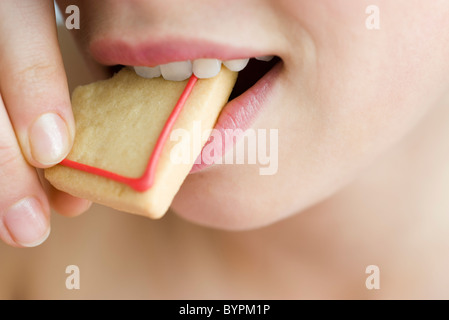 Mordere in cookie Foto Stock