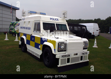 Polizia corazzata Landrover PSNI Foto Stock