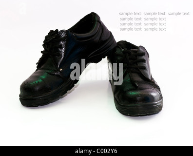 Scarpe di sicurezza per evitare incidenti alla persona che indossa il corpo. Foto Stock