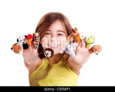 Carino e felice ragazza che gioca con il dito marionette Foto Stock