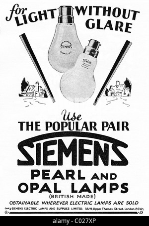 1920s annuncio nella rivista di consumatori per SIEMENS pearl e opale lampade a luce Foto Stock