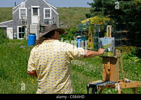 Artista, classe d'arte pittura, cavalletto, colonia di artisti, Monhegan Island, costa del Maine, New England, STATI UNITI D'AMERICA Foto Stock