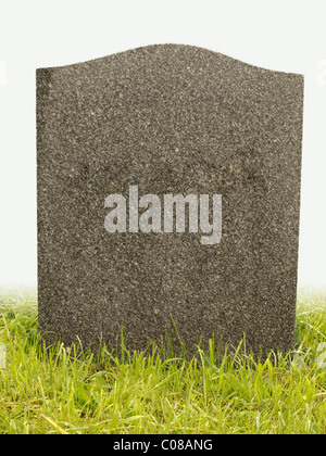 Singola pietra grave sul retro bianco massa fuori taglio Foto Stock