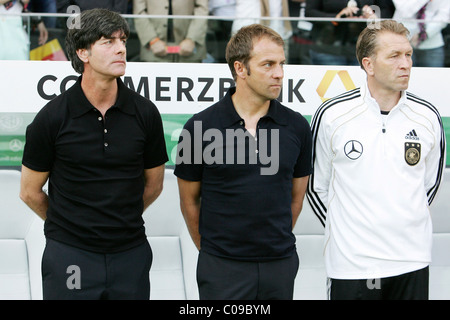 Allenatore tedesco Joachim 'Jogi' Loew, assistant coach Hansi Flick e goalkeeping coach Andreas Kopke Foto Stock