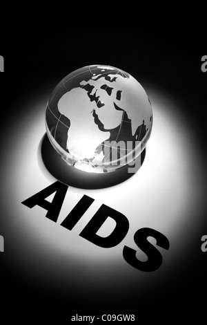 Globe, il concetto globale di diffusione di AIDS e di prevenzione Foto Stock