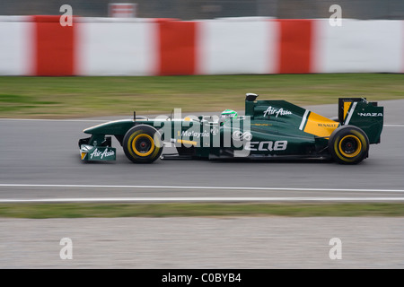 Heikki Kovalainen con la sua Lotus nella seconda giornata di prove nel circuito di Montmelò Foto Stock