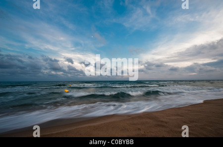 Tramonto in Coma-ruga, mare Mediterraneo Foto Stock