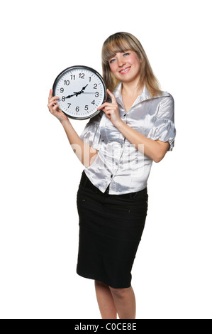 La donna d'affari con orologio in mani. Esso è isolato su sfondo bianco Foto Stock