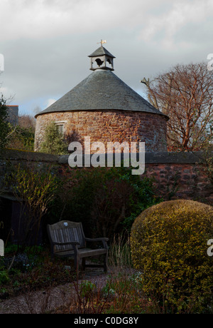 Dovecots Dunster in un villaggio storico e Castello con cottage con il tetto di paglia in Somerset.Inghilterra Foto Stock