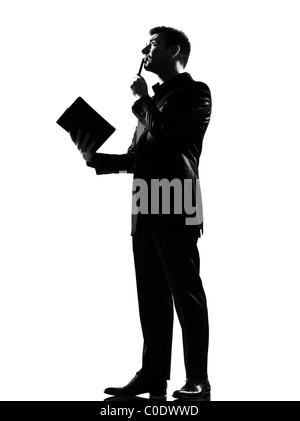 Silhouette caucasian uomo d affari con appunti pensando che esprimono il comportamento di lunghezza completa su studio isolato sfondo bianco Foto Stock
