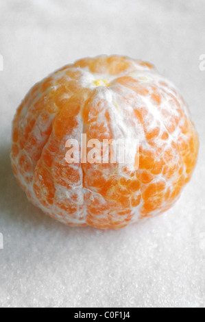 La cancellata tangerine su zucchero semolato Foto Stock