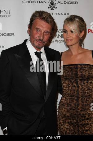 Johnny Hallyday e Laetitia Boudou Grand Apertura di 'Christian Audigier Nightclub' al Treasure Island hotel casino Las Foto Stock