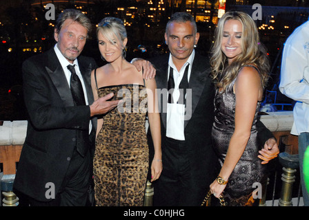 Johnny Hallyday, Laetitia Hallyday, Christian Audigier e Ira Audigier Grand Apertura di 'Christian Audigier Nightclub' a Foto Stock